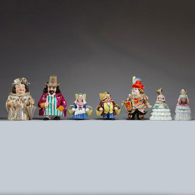 Ensemble de sept pots à tabac figuratifs en porcelaine polychrome, Paris, XIX-XXème