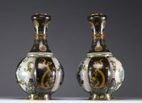 China - Pair of cloisonné enamel vases with flowers and dragons, Qing dynasty, circa 1900.