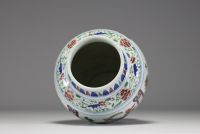 China - A 19th century polychrome porcelain vase with floral decoration.