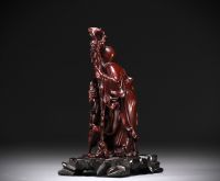 China - Wooden sculpture representing Shou Lao and a child, circa 1900.