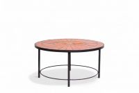 Rogier Vandeweghe (1923-2020) & Amphora (XXe) Table vintage en carreaux de céramique vernissée orange monogrammée M. V. et piètement tubulaire métallique noir,  vers 1960-70.