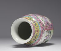 China - A Republic-period famille rose porcelain vase decorated with cartouche figures, flowers and insects (Apocryphal Qionlang mark)