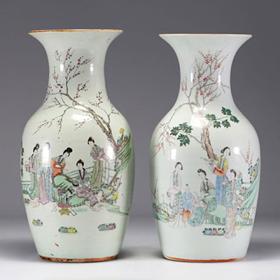 China - A pair of famille rose porcelain vases with courtesans, early 20th century.