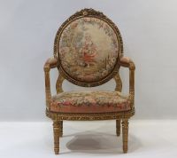 Important set of carved and gilded wood salon furniture, fine Aubusson tapestry including a sofa and a suite of four bergère armchairs, 19th century.