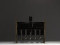 Jacques ADNET (1900-1984) Brass and leather magazine rack, circa 1940.