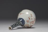 Japan - Sake bottle in porcelain with floral decoration.