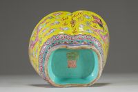 China - A pink family polychrome porcelain bowl decorated with an Imperial dragon on a yellow background, Tao Kuang mark and period.