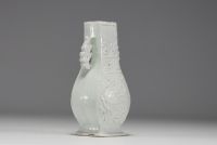 China - Monochrome white porcelain vase with relief Phoenix decoration, Ming dynasty.