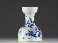 China - A blue-white porcelain vase decorated with dragons, Qing mark under the piece, 19th century.