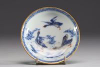 China - Set of four polychrome porcelain bowls and plates with floral decoration and ducks.18th