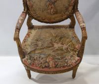 Important set of carved and gilded wood salon furniture, fine Aubusson tapestry including a sofa and a suite of four bergère armchairs, 19th century.
