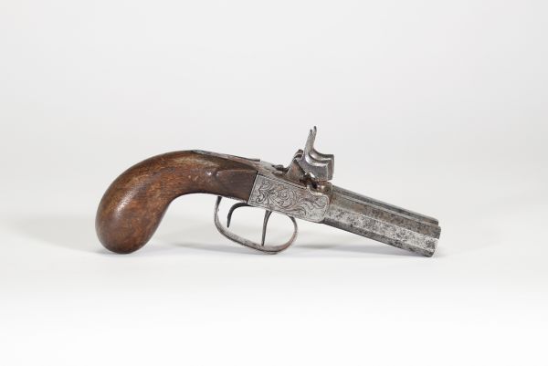  Pistolet double à percussion, canon octogonal, platines ciselées, XIXème.