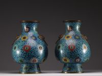China - Pair of bronze vases in cloisonné enamel with lotus and foliage decoration, handles with taotie heads, Ming period.