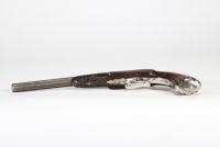 Pistolet de tir de type Flaubert, canon octogonal ciselé, crosse en noyer, XIXème, en coffret.
