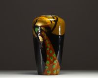 Art Nouveau porcelain vase decorated with a peacock.