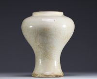 China - Meiping vase in white monochrome porcelain, mark at the base of the piece, Yuan dynasty.