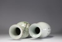 China - A pair of famille rose porcelain vases with courtesans, early 20th century.