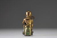 China - Ming period gilt bronze figurative statue of a servant.
