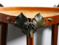 Louis MAJORELLE (1859-1926) Beautiful mahogany pedestal table decorated with water lilies in green patinated bronze.