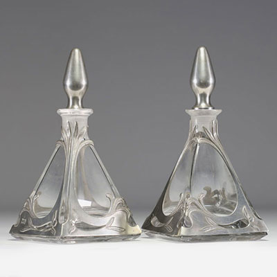 Pair of glass and pewter decanters in the Art Nouveau style.