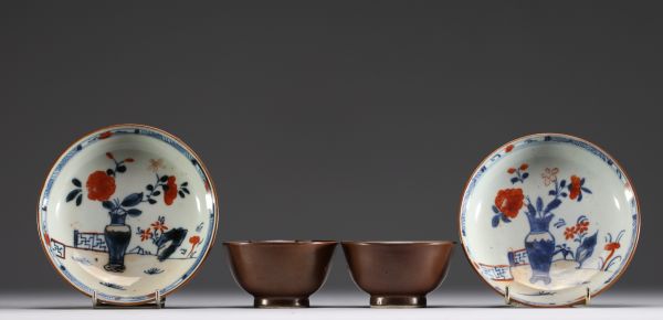 China - Set of two porcelain bowls and plates with interior floral decoration and nasturtium, 18th century.