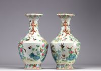 Rare large pair of Famille rose porcelain vases decorated with birds and flowers, 19th century.