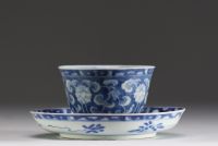 China - Bowl and plate in white-blue porcelain with floral decoration, mark under the piece, 17th century.