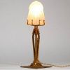 lampe de  table en fer forgé doré et verre moulé signé SABINO
