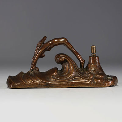 Art Deco bronze table lighter in the shape of a woman diving into the sea.