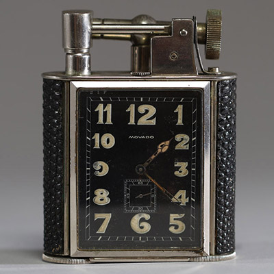 Movado - Rare briquet montre de table en métal, mouvement mécanique, vers 1920.