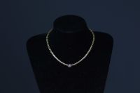 Necklace in 18k gold and brilliant-cut diamonds weighing 40g.