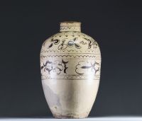 China - Cizhou glazed stoneware jar decorated with a floral frieze and calligraphy, Yuan-Ming.
