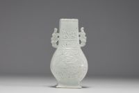 China - Monochrome white porcelain vase with relief Phoenix decoration, Ming dynasty.