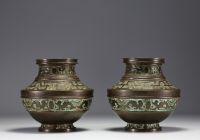 China - Pair of bronze vases decorated with Fô dogs, debossed mark under the pieces.