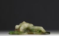 Amalric WALTER (1870-1959) - Sculpture in pink and green glass paste in high relief depicting a young girl lying in the waves, signed.