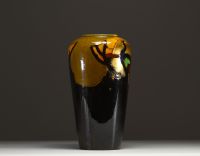 Art Nouveau porcelain vase decorated with a peacock.