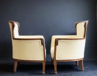 Louis MAJORELLE (1859-1926) Pair of Art Nouveau armchairs in moulded mahogany with fruit and flower motifs.