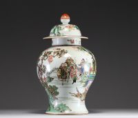 China - Covered vase in green family polychrome porcelain decorated with characters, circle mark under the piece.