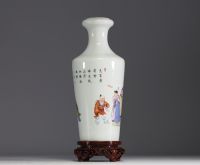 China - Famille rose porcelain vase decorated with magi and poem.