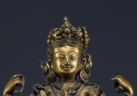 China - Tibet - A 17th century ormolu figure of Shadakshari Lokeshvara.