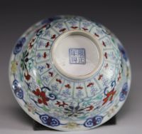 China - Doucai porcelain bowl decorated with flowers, Yongzheng mark under the piece.