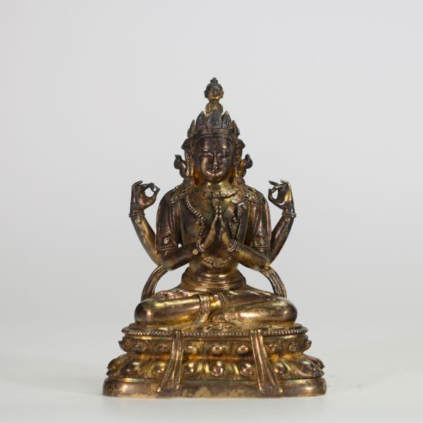 CHINE,  XIXe Figure d’Avalokiteśvara à quatre bras en bronze doré.