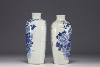 China - Pair of blue-white porcelain vases with floral and poem decoration, 19th century.
