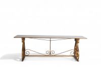 Table de salon en marbre, pied en fer forgé doré, dans le goût de Gilbert Poillerat, vers 1940-50.