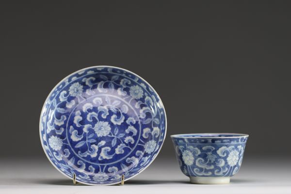 China - Bowl and plate in white-blue porcelain with floral decoration, mark under the piece, 17th century.