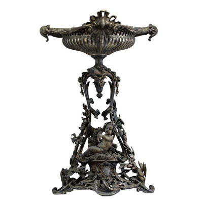 Imposant milieu de table en bronze ciselé argenté à décor de figures de Bacchus enfant, XIXème.