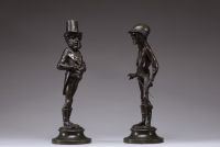 Émile GUILLEMIN (1841-1907) Suite de deux personnages grotesques en bronze patiné dans le style Daumier, signés sur la terrasse.