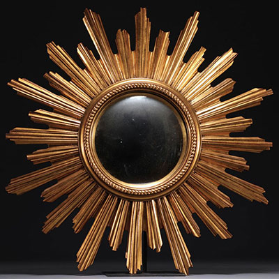 Sun mirror in gilded resin, circa 1960/70.