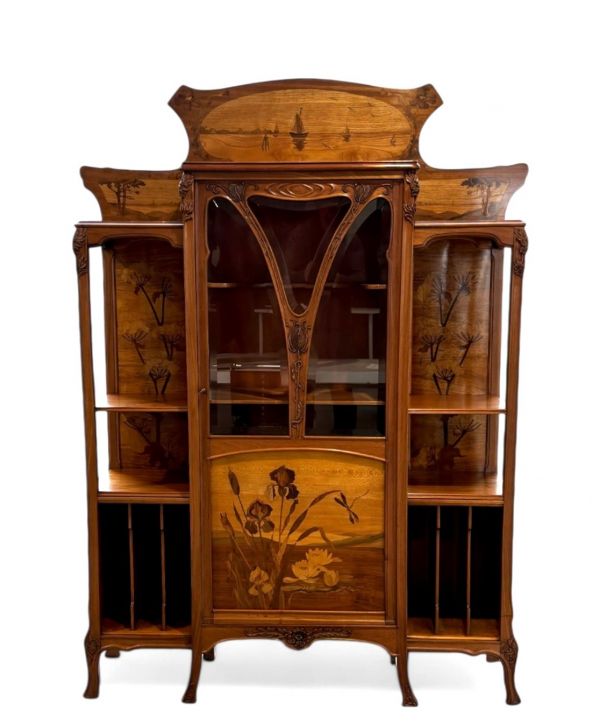Art Nouveau walnut display cabinet, richly inlaid with irises, water lilies and dragonflies, Ecole de Nancy, circa 1900.