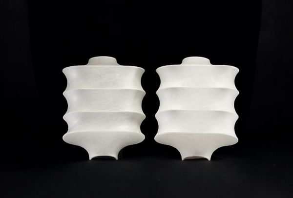 Pair of ‘Cocon’ wall lights, circa 1980.